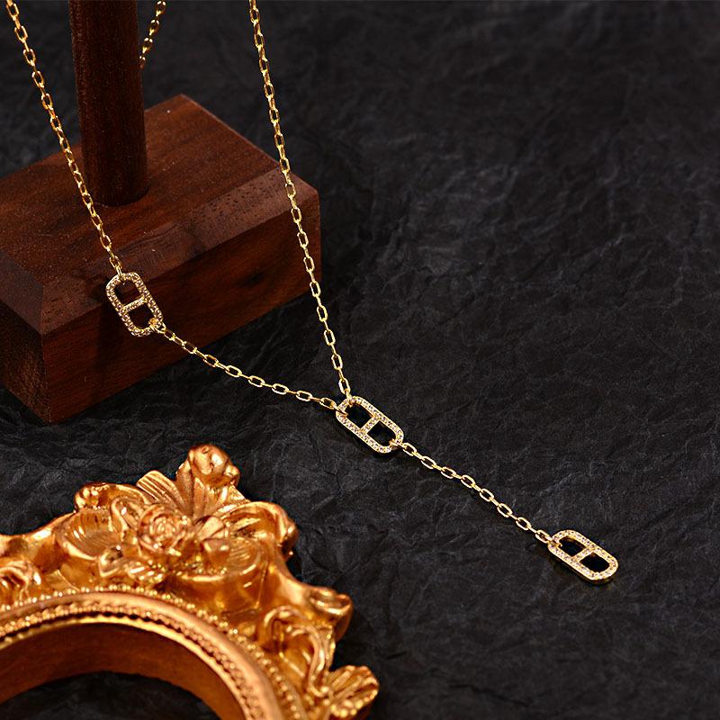 High-End Französische Diamantbesetzte Schweinenasen-Halskette Damen Nischen-Design Vielseitige Pulloverketten-Accessoires