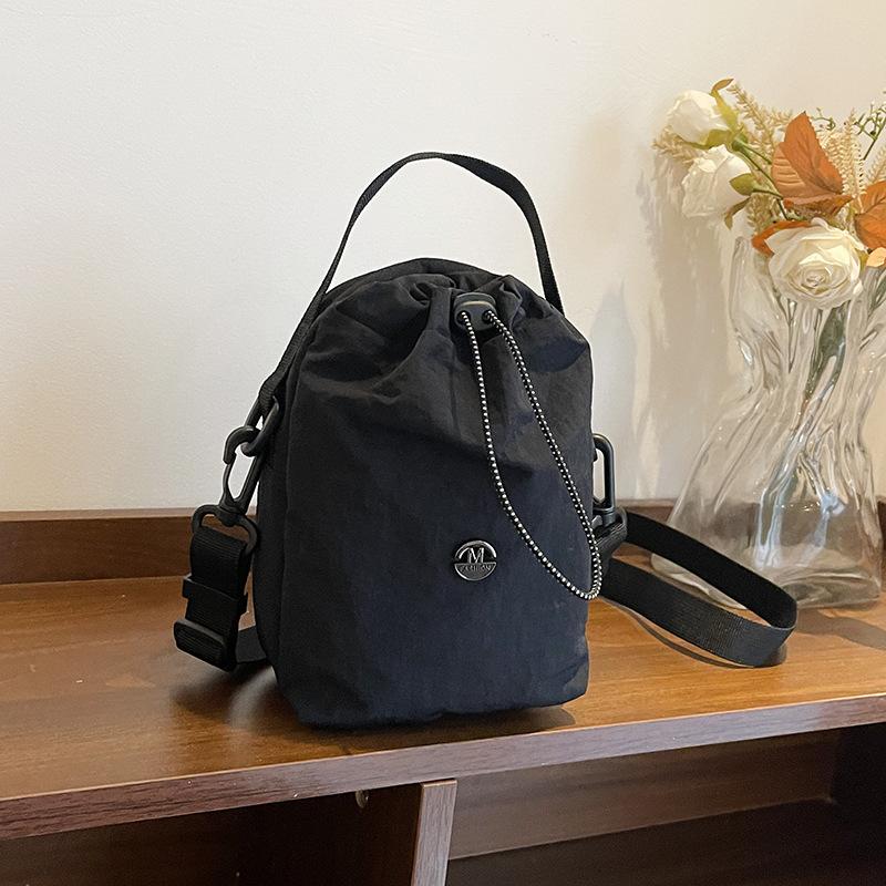 Kettle bag waterproof casual shoulder bag women's tide brand versatile mobile phone bag fitness walking messenger bag water cup cloth bag men