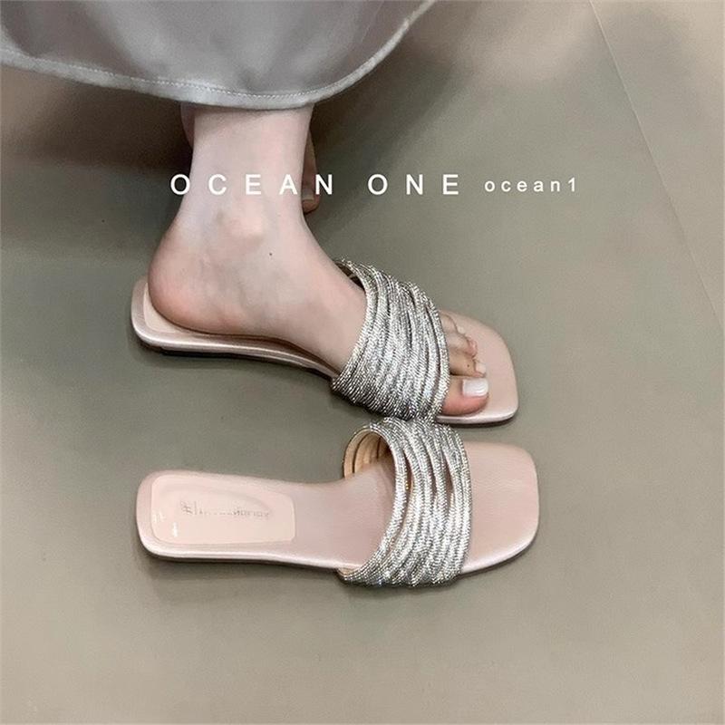 Sanfte Feenwind kühle Hausschuhe weiblich Sommer tragen 2025 neu Strass süß mit Rock Urlaub Strand Ein-Wort