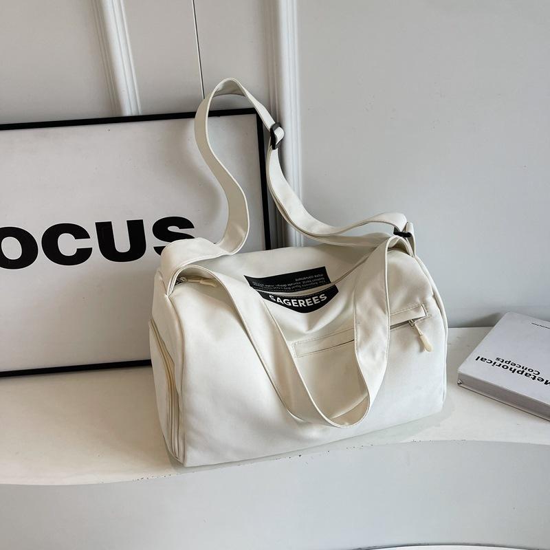 Travel bag large capacity high sense high value light fashion niche shoulder bag trendy fitness bag