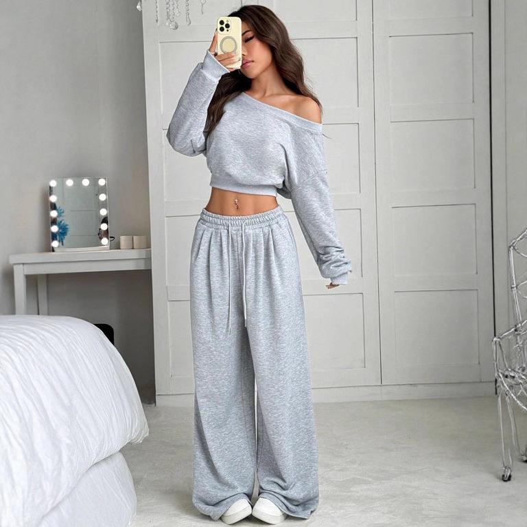 [Spot] 2025 new product explosion European and American casual suit solid color sweater women's one-word collar off the shoulder loose knitting