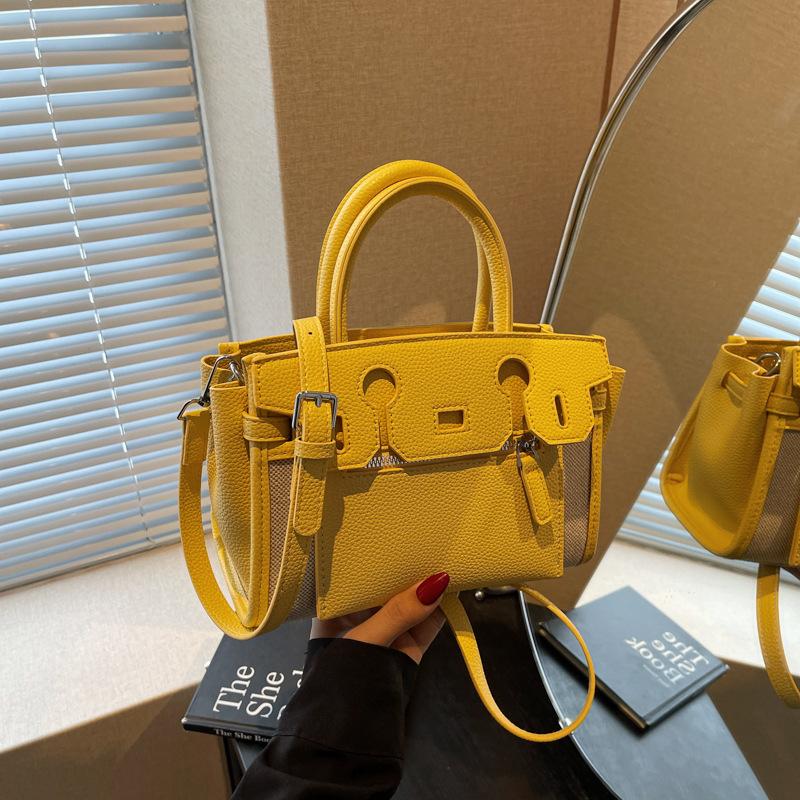 High-end contrasting color small bag women's new versatile messenger bag fashion handbag commuter bucket bag