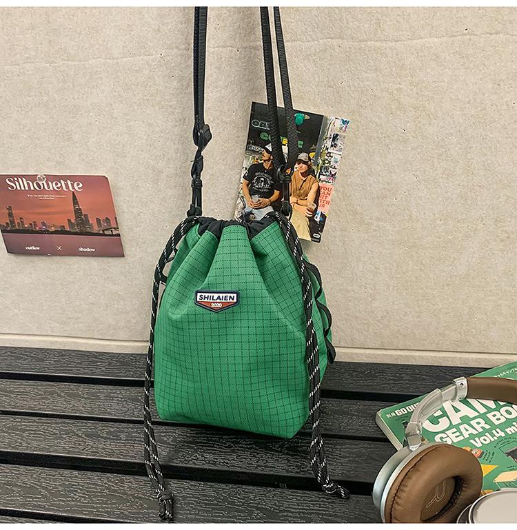 Tide brand messenger bag, men's and women's outdoor sports, girls' drawstring, bundle, color matching, one-shoulder small bucket backpack.