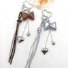 New Leather Heart Pendant Bag Keychain with Braided Rope and Bow Design