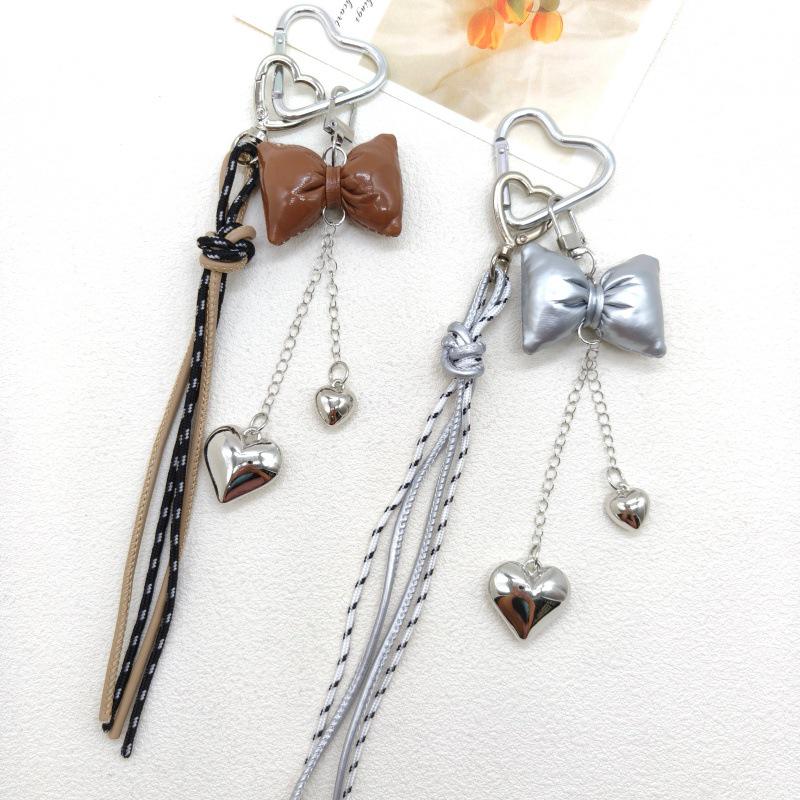 New Leather Heart Pendant Bag Keychain with Braided Rope and Bow Design