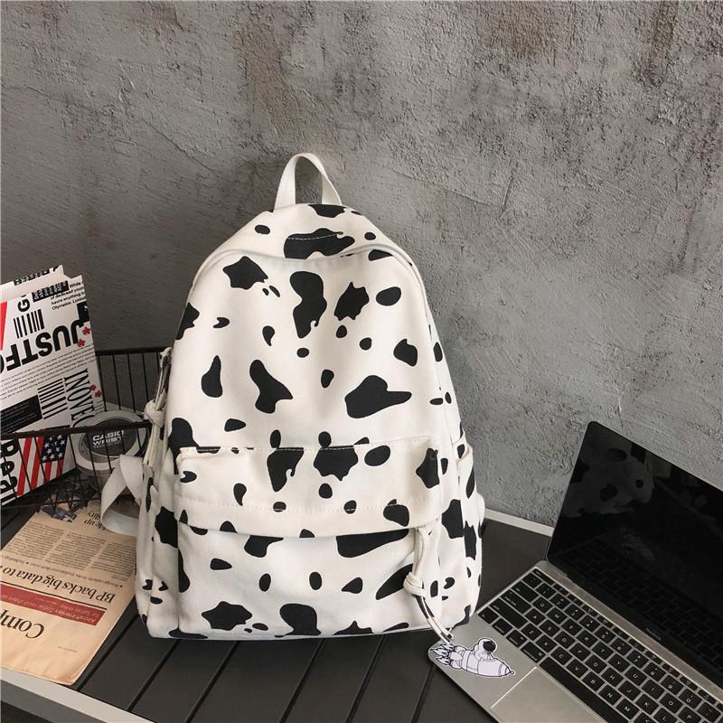 Schoolbag female Korean version Harajuku ulzzang Mori girl canvas backpack ins fire cow pattern backpack