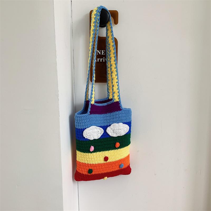 

Internet celebrity rainbow knitted large-capacity bucket bag is popular this year, autumn and winter on the new 2025 small fresh portable underarm bag