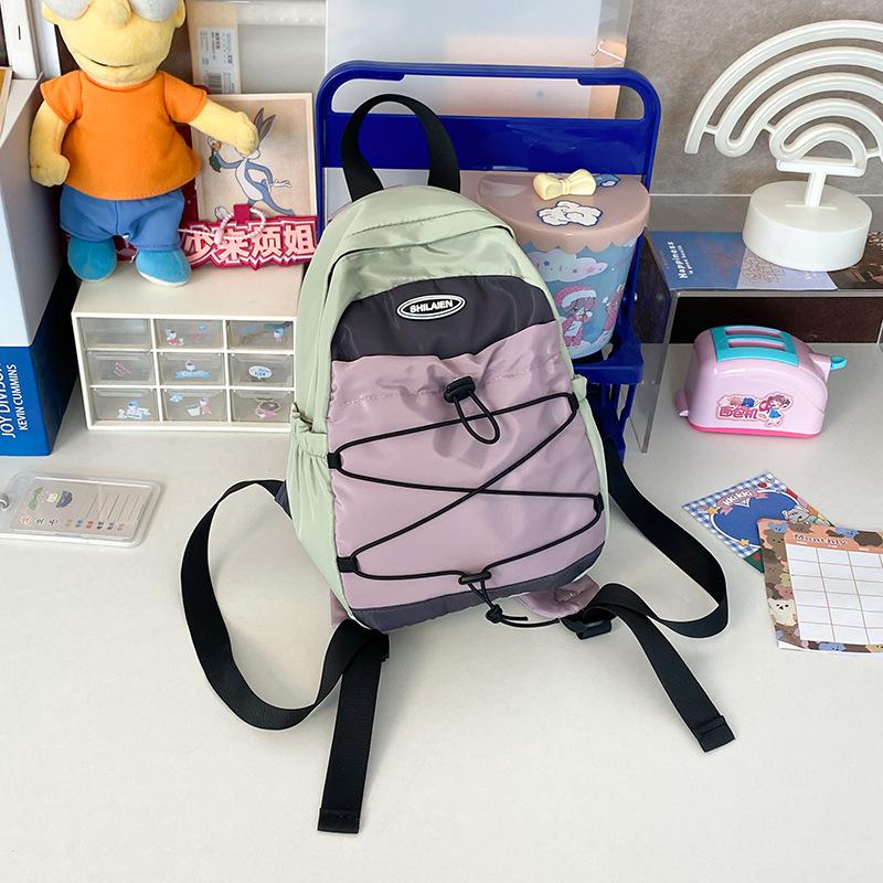 Outdoor travel bag mini fashion small backpack new Korean light boys and girls backpack junior high school hiking bag