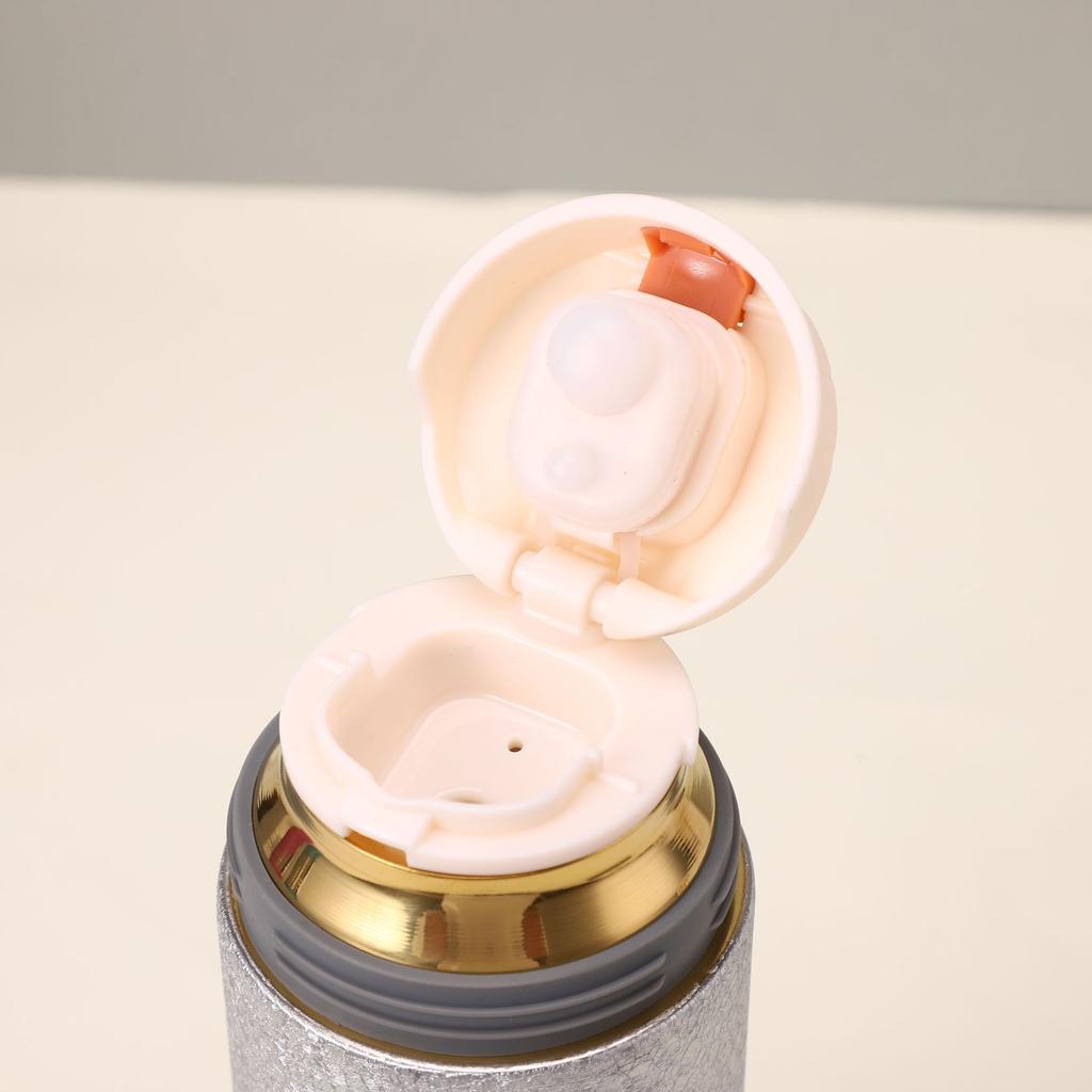 Light luxury hammer pattern titanium covered thermos cup fashionable tea separation ice crystal health tea cup high-end business gift titanium cup