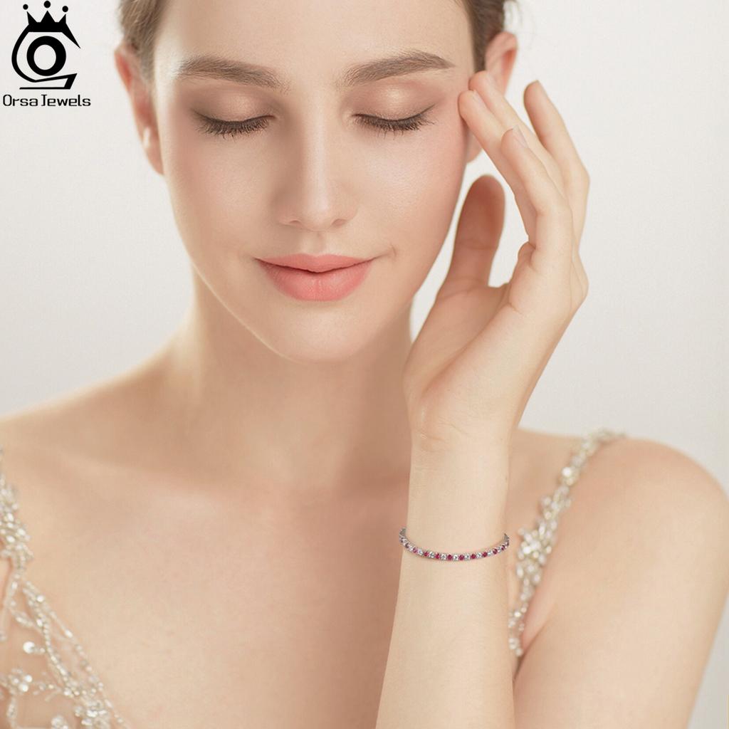 ORSA JEWELS Glamorous 925 Sterling Silver Tennis Bracelet With a Stunning Oval-Cut Red Zirconia, Perfectly Crafted Jewelry SB138