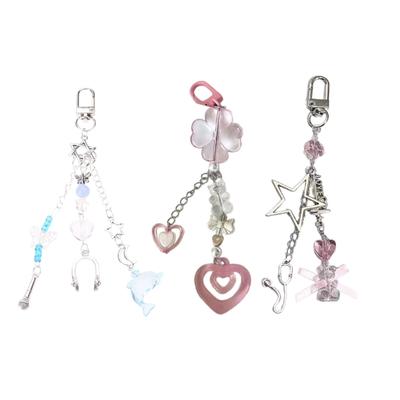 Porte-clés perlé fait main Pendentif cœur nœud papillon doux Porte-clés Chaîne de téléphone mode pour femmes Charme de sac Bijoux esthétiques