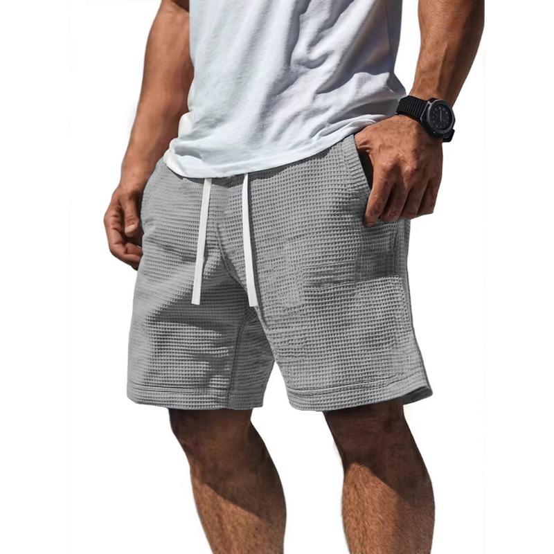 Pantaloncini casual da uomo a tinta unita in maglia waffle con coulisse in vita