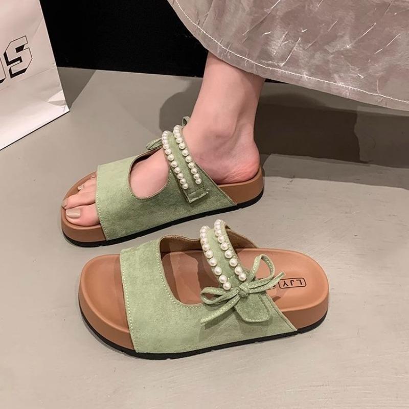 Retro thick-soled one-character pearl sandals summer new bow-tied cool slippers college style hollow slippers