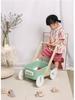 Multifunctional Baby Walker: Wooden Pull-Along Toy for Early Learning and Storage Habits.