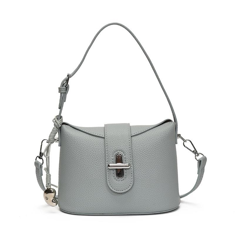 Niche design fashionable versatile commuter handbag women's spring new simple messenger bucket bag