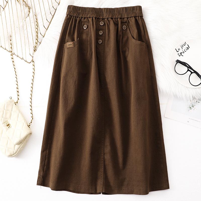 

Реальный снимок 2025 года, осень, новая литературная и ретро-юбка однотонного цвета, женская эластичная талия, пуговицы показывают тонкую юбку А-образного силуэта для поездок на работу one size fits all темно-коричневого