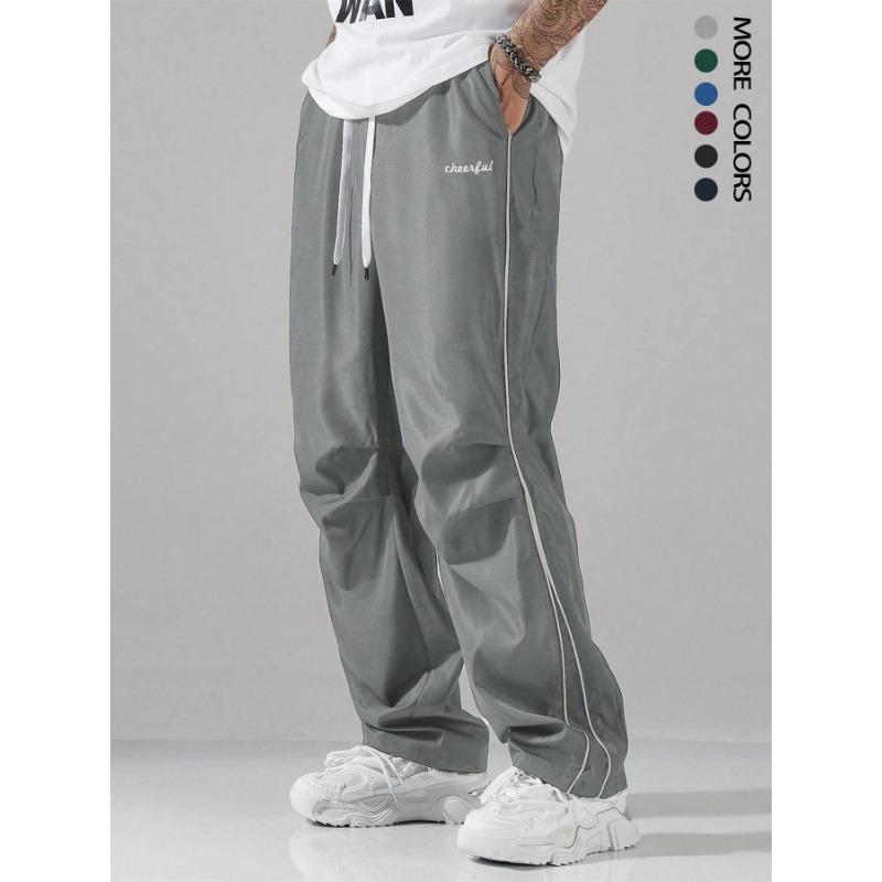 Men Letter Print Side Stripe Drawstring Waist Loose Casual Long Pants S