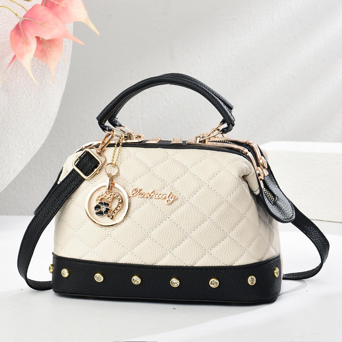 This year, pillows are popular, hand-carried small bags, new textured large-capacity embroidered thread women s bags, foreign-style shoulder bags.