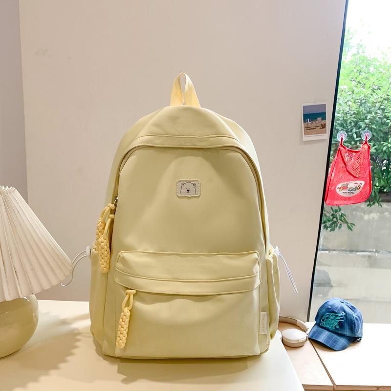 New Niche Primary School Students Boys and Girls Universal Large-capacity Lightweight Simple Korean Version Solid Color Large-capacity Schoolbag