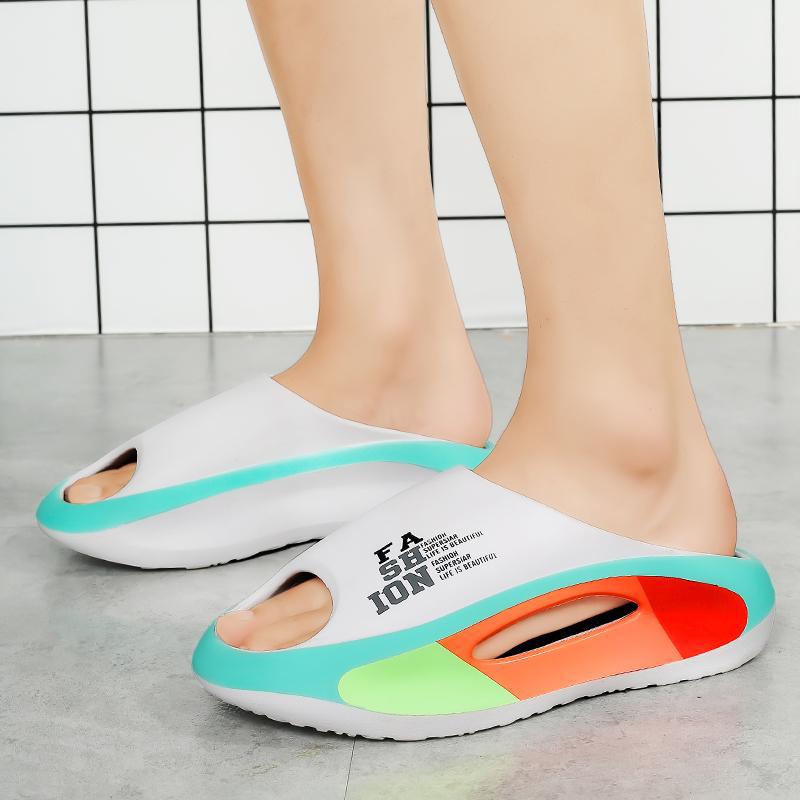 New summer color matching EVA thick bottom stepping on shit feeling couple one-word drag casual men's and women's slippers fashion sports trend drag