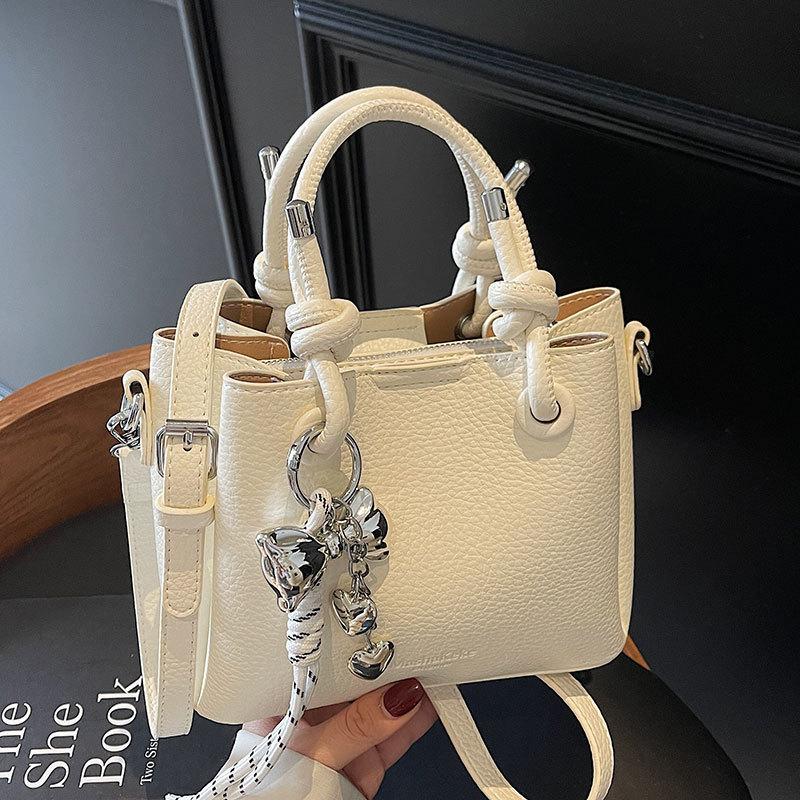 New trend casual simple wind portable bucket bag high-end lychee pattern messenger women's bag