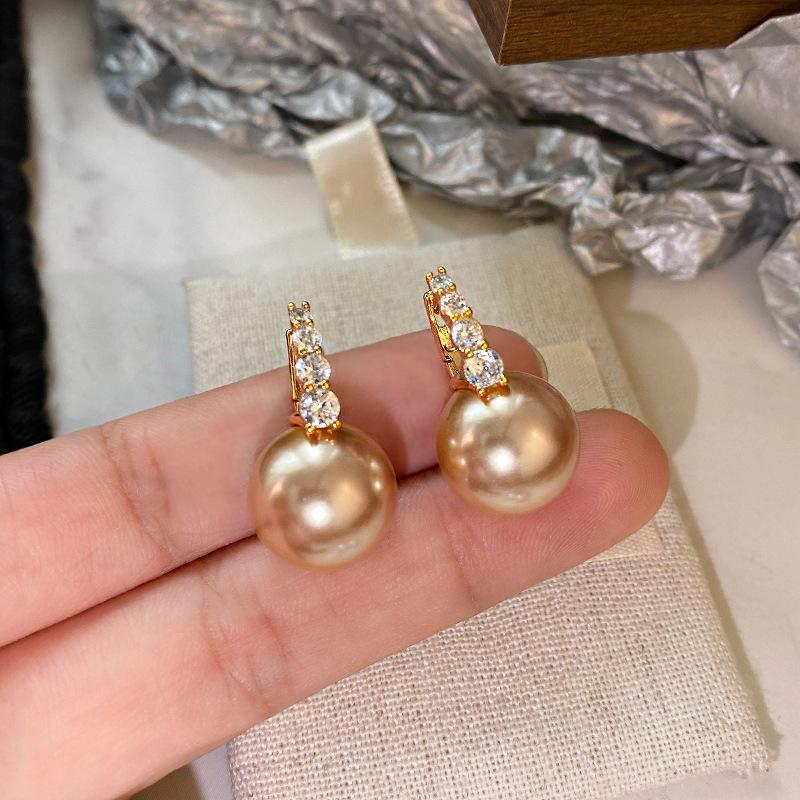 Real gold electroplated A-grade zircon natural pearl stud earrings high-end light luxury champagne color popular fashion commuter ear buckles