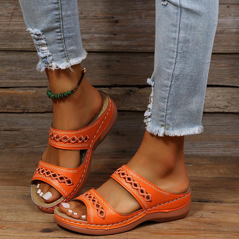 Spring and summer new season large size hollow slope heel cool slippers women wish hollow outside wear non-slip retro