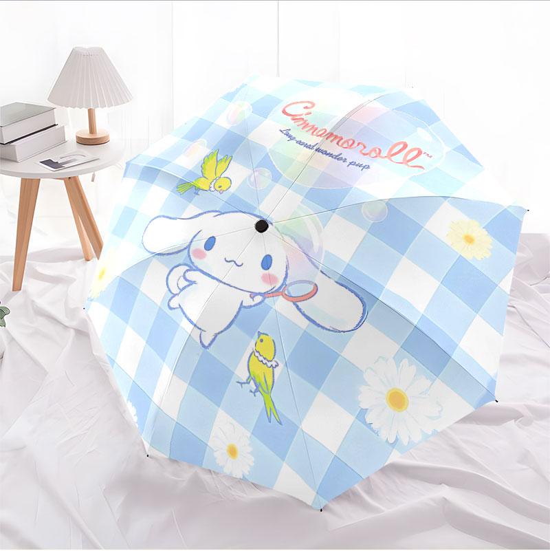 Portable travel umbrella with cute Sanrio character designs, UV-protective folding umbrella.