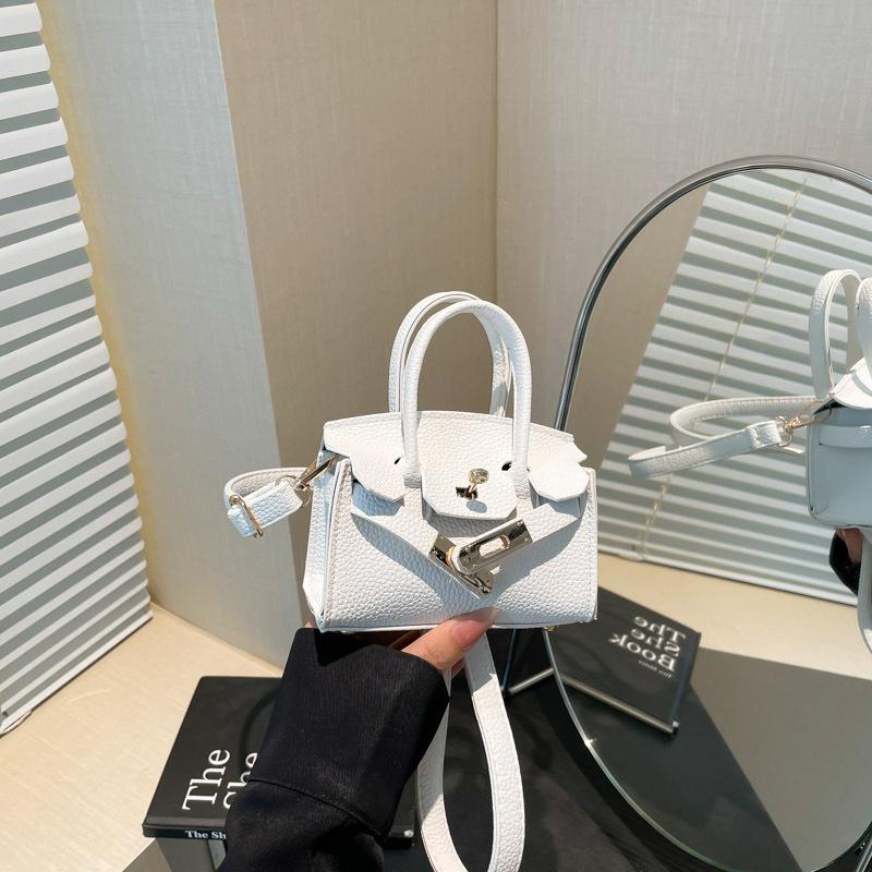 

New lock children s bag simple and fashionable change bag mini parent-child messenger bag белый