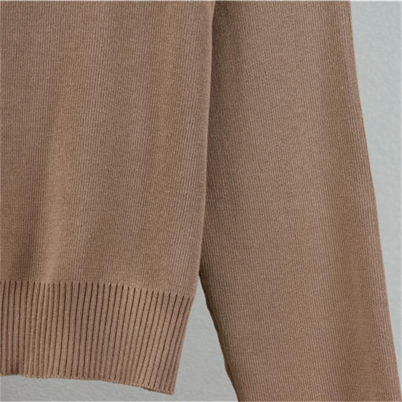 Women's autumn and winter knitted suit Fashionable round neck top contrasting color hip hugging skirt two-piece set