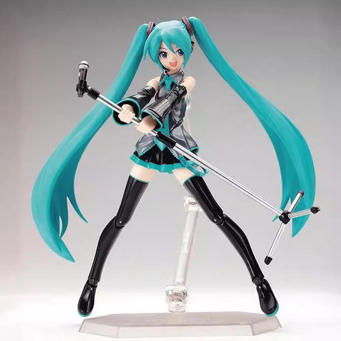 In Stock: Hatsune Miku Figma014 Articulated Action Figure with Face Changing Feature and Box.