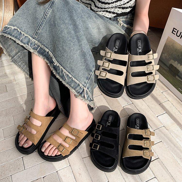Korean version of casual one-word buckle holiday slippers for women's summer wear 2025 new thick-bottomed cork beach cool slippers