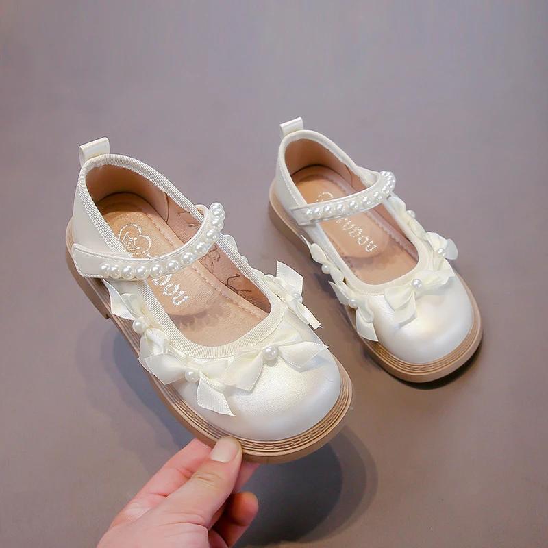 

2024 Детские кожаные туфли для девочек, осенние новые модные корейские туфли с мягкой подошвой, нескользящие, элегантные универсальные туфли на плоской подошве для принцесс 26 бежевый