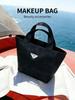 Prada Schwarze Mini-Tragetasche Make-up-Tasche Dreieckiges Metall-Logo Tragbare Hand-Kosmetik-Aufbewahrungstasche für Damen Reise Täglich