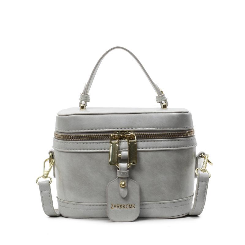 

2025 new casual simple solid color versatile portable box bag women s commute fashion temperament messenger bag сірий колір