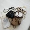 Retro Semi-round Soft Leather Rivet Corner Commuting Niche Texture Handbag