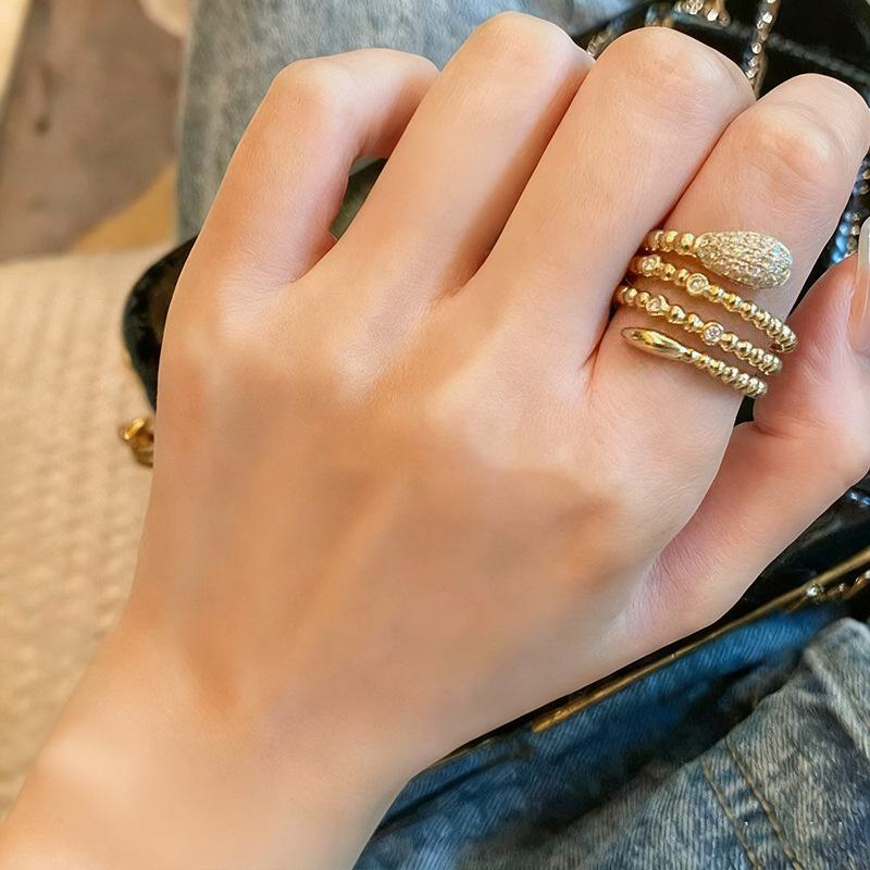 Spiral metal plating bead ring women, serpentine hovering design niche jewelry Douyin