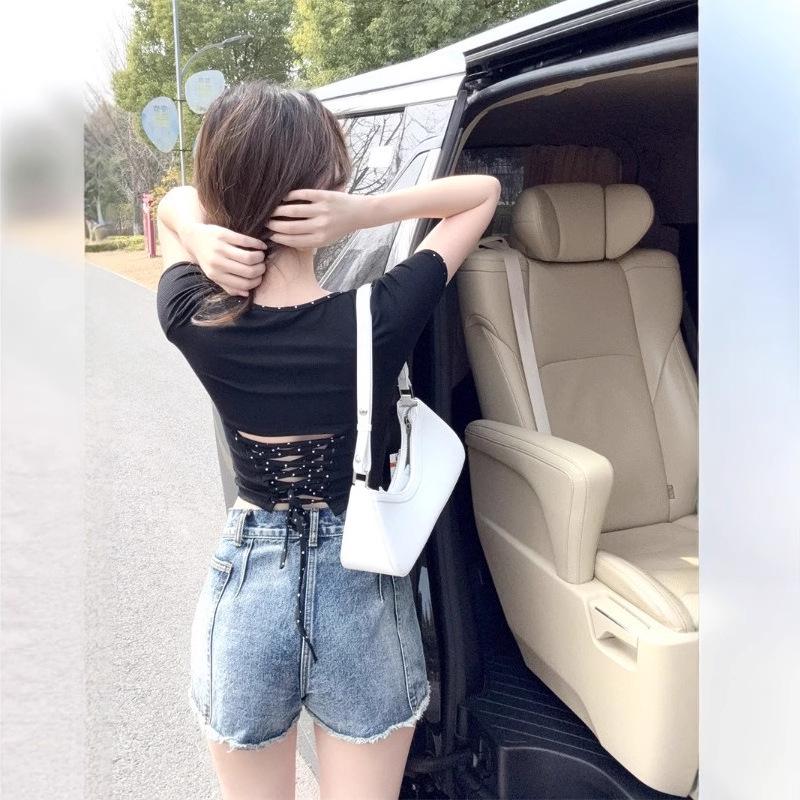 

Женская стильная футболка с цветными блоками, завязками сзади, прямыми плечами и короткими рукавами L чёрный