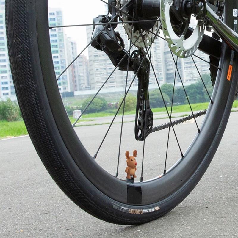 Tappi valvola luminosi a forma di osso e set di accessori per bicicletta