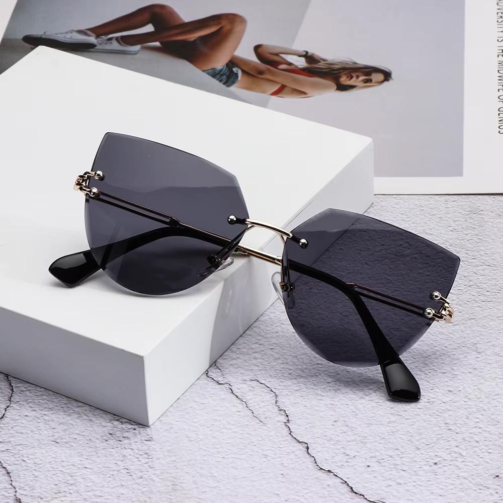 New Frameless Sunglasses Fashion Cat Eye Lentes De Sol Mujer Street Photography Trendy Accessories