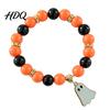 Handmade Beaded Elastic Wristbands Halloween Bracelet for Women Orange Black Beads Stretch Ghost Jewelry with Charm Stackable Holiday Accessory