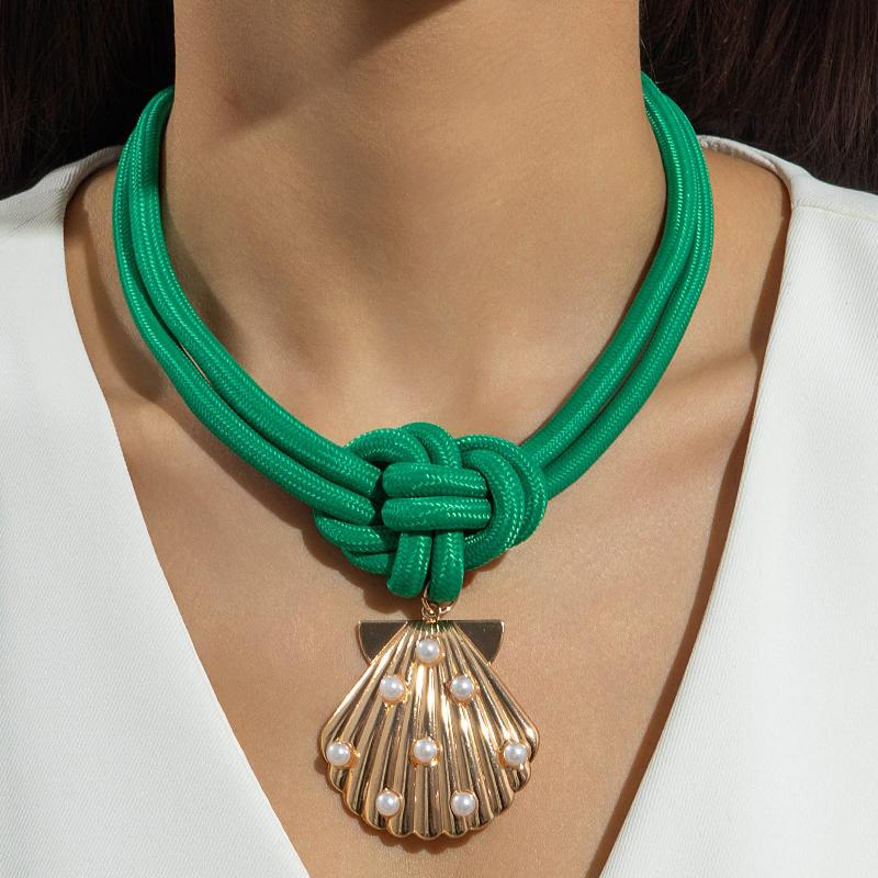 A Unique Knotted Design Necklace With Leaves Starfish And Scallops A Simple Drawstring Pendant Necklace With A Bow And Pearls