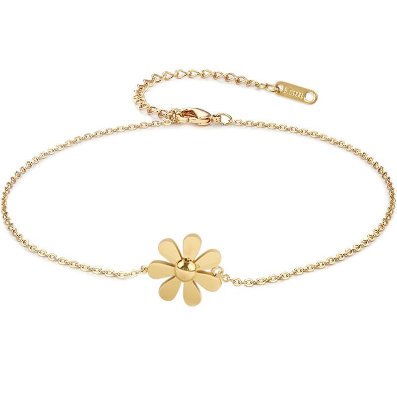La catena del piede in acciaio al titanio con fiori da donna non sbiadisce i piedi di nicchia della personalità del colore