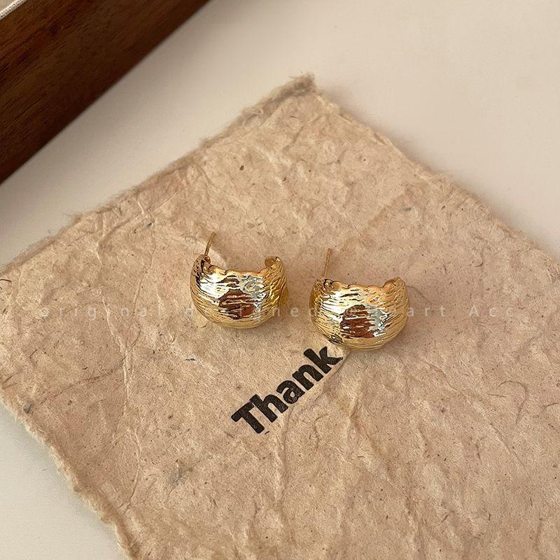 

Cold Style Metal Texture Women s Niche Design Earrings Gold-textured stud earrings (silver needles)