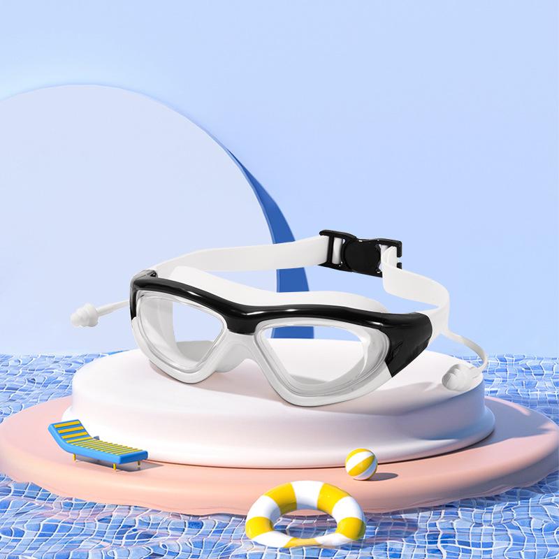 Kinder Wasserdichte, Beschlagsfreie Schwimmbrille mit Ohrstöpseln – Großer Rahmen, HD Taucherbrille für Jungen & Mädchen.