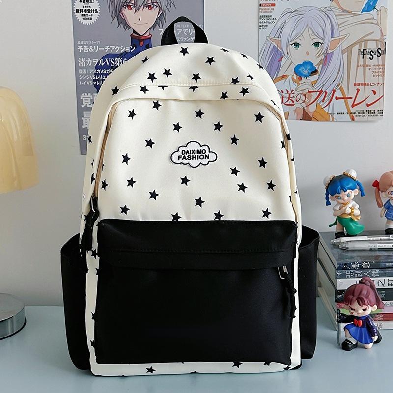 2025 new schoolbag women ins niche large-capacity backpack campus junior high school students high value simple backpack