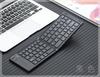 Tragbare Bluetooth-Tastatur mit Doppelfaltung für mobile Geräte und Laptops