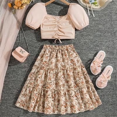 გოგონების მოდის ნაკრები საზაფხულო ბავშვთა მოკლე მკლავიანი ზოლიანი ზედა ყვავილების ნახევარი ქვედაკაბა ორი კომპლექტი