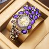Rhinestone Peacock Hollow Out Bangle Wristwatch Women Quartz Watch