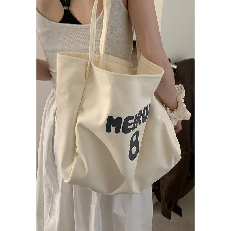 

Korean version lazy wind bag women s backpack 2025 summer new canvas bag large capacity women s simple shoulder bag